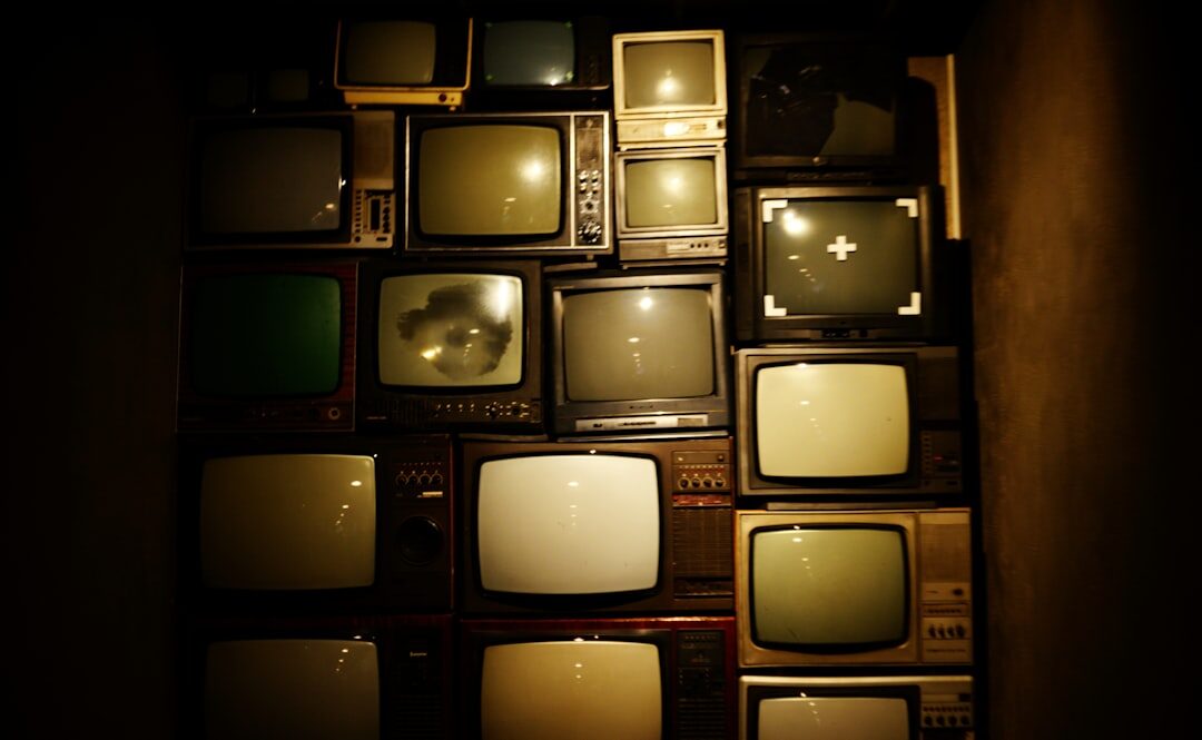 Shelves of archived videotapes and film reels in a television archive room