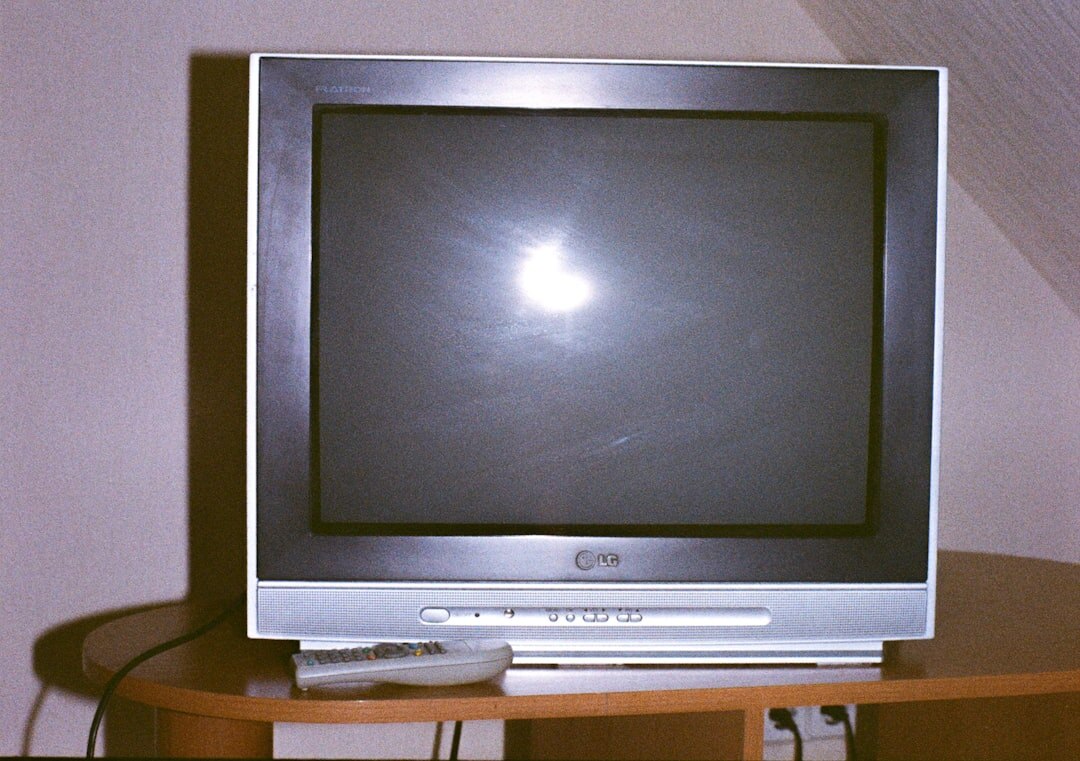 vintage television set on wooden table