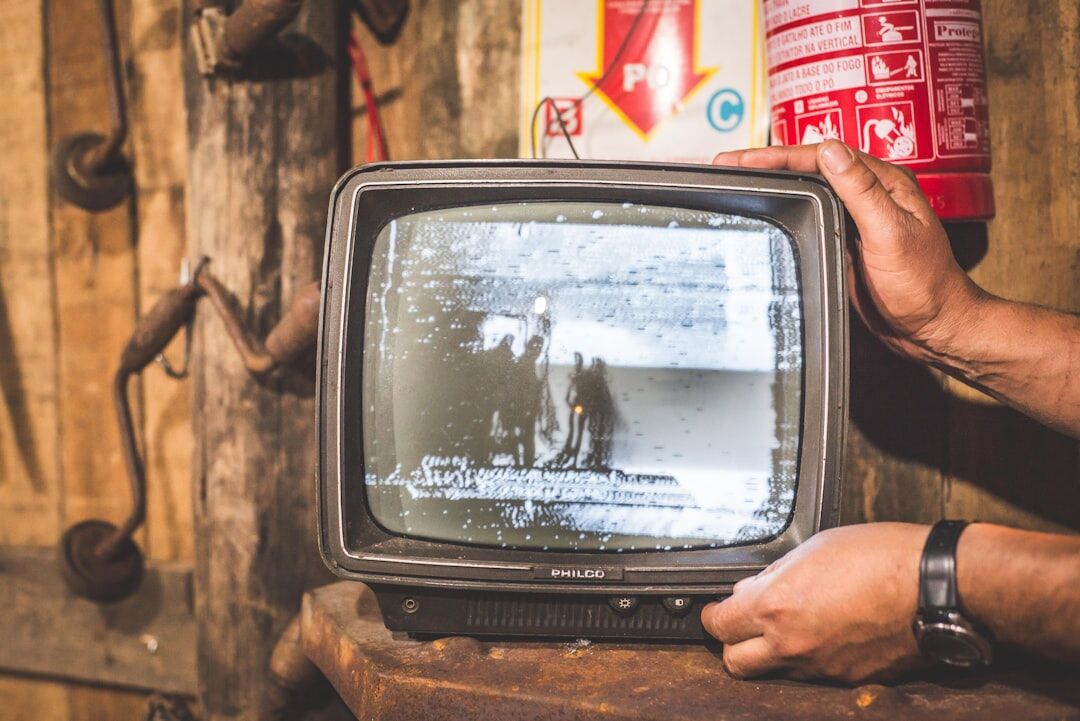 family watching old tv