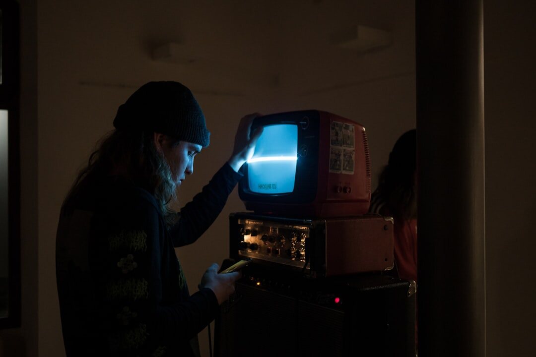 person watching old tv